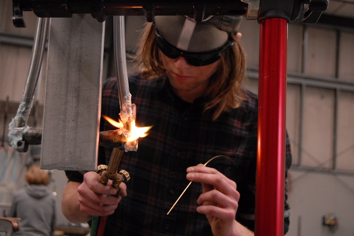 Reese brazing in his own dropouts on his own custom steel rando/road bike. 